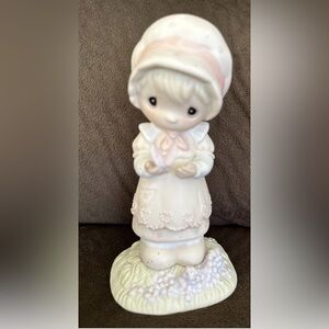 Adorable Figurine with Pink Accents
PRECIOUS MOMENTS